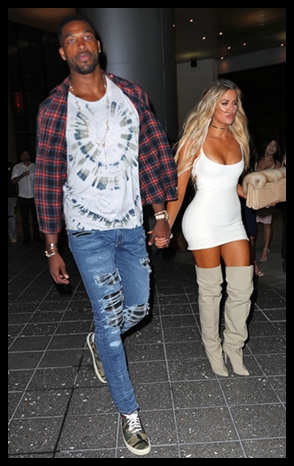 Tristan Thompson and Khloe Kardashian holding hands in Miami.
